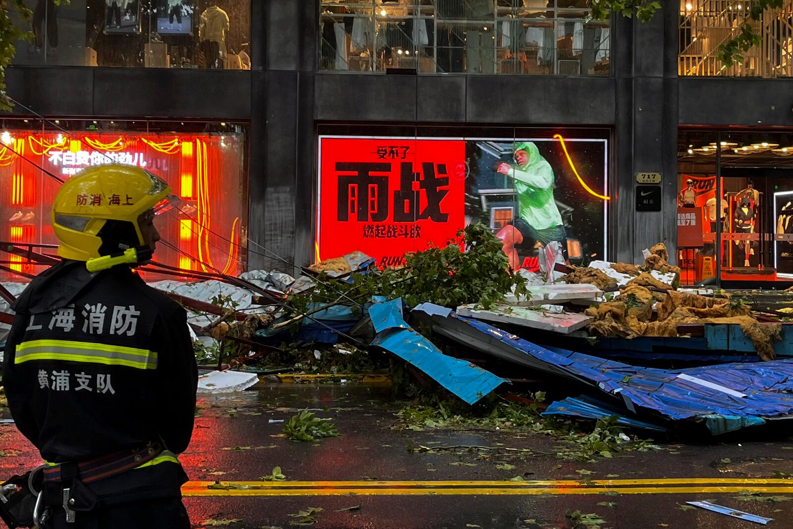 Flooded streets and uprooted trees in Shanghai