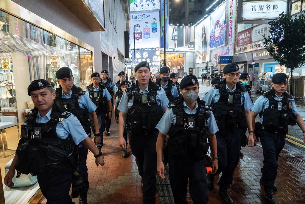 Hong Kong revokes passports of activist exiles