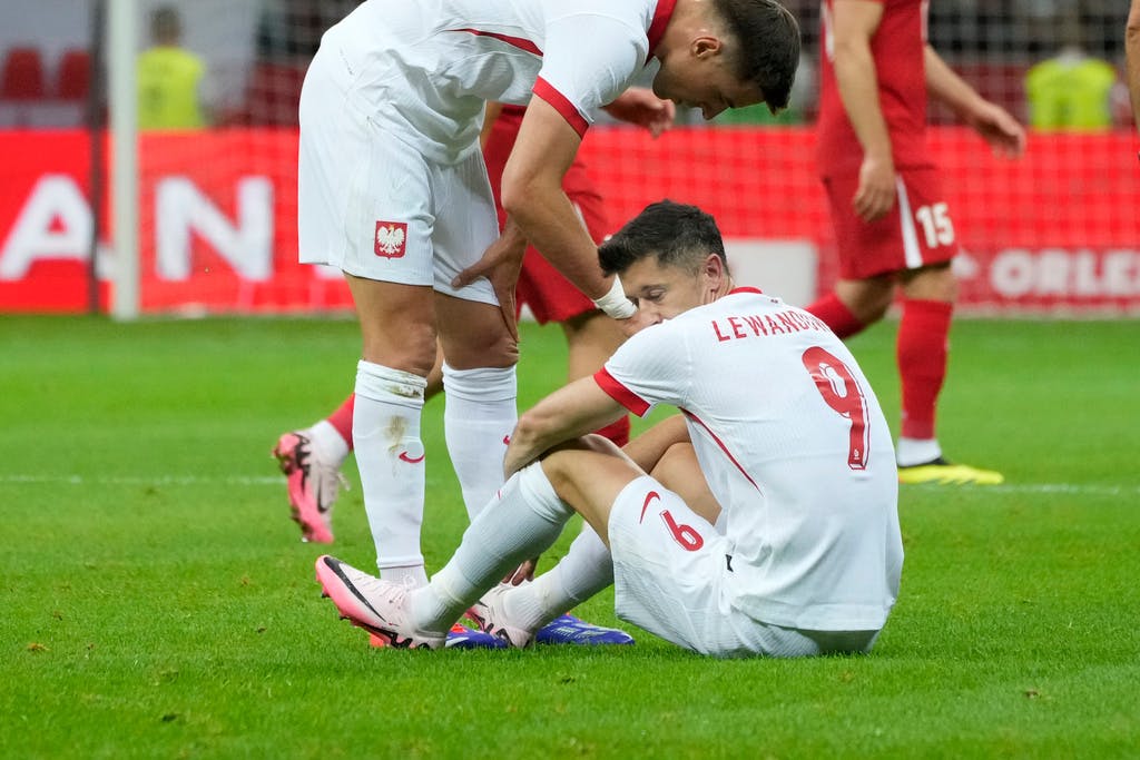 Injured Lewandowski misses European Championship premiere