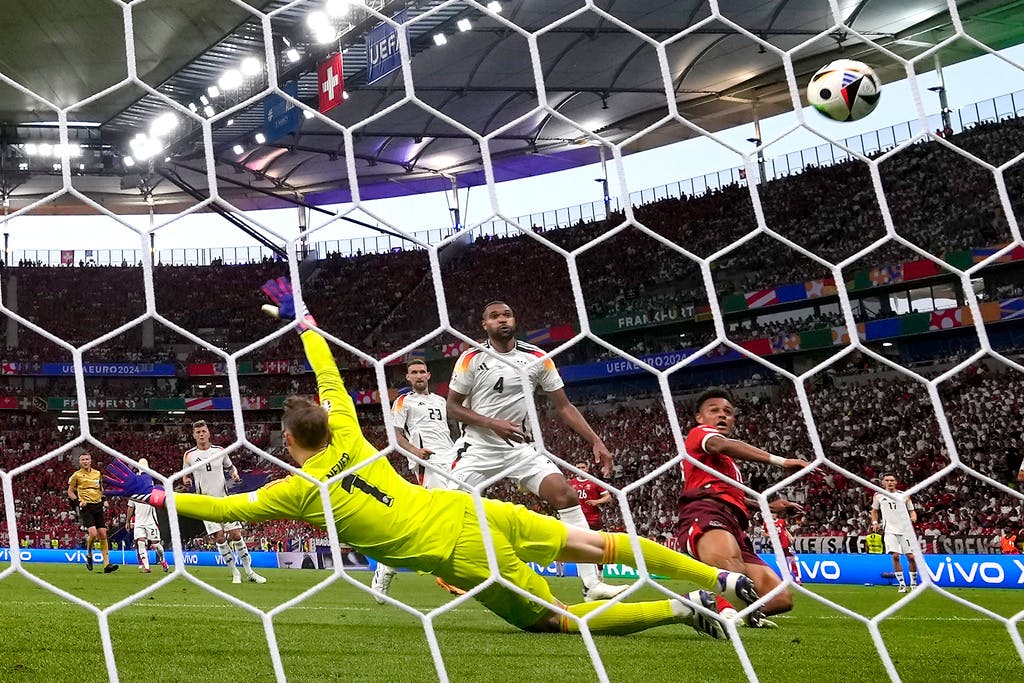 Stoppage time saves Germany and Hungary
