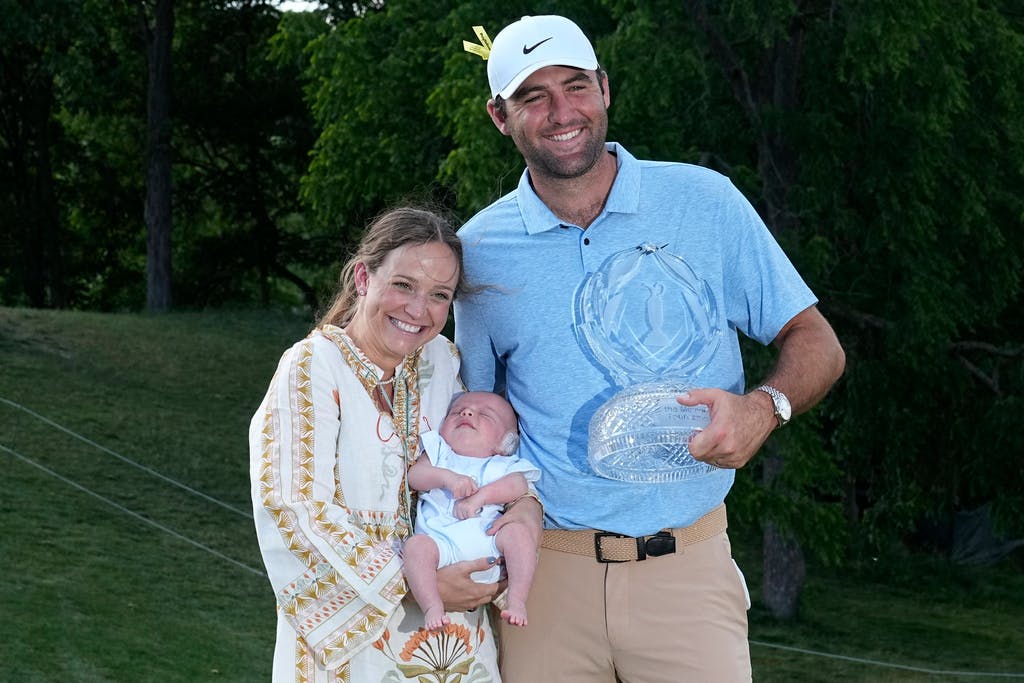World number one wins – celebrated with newborn son
