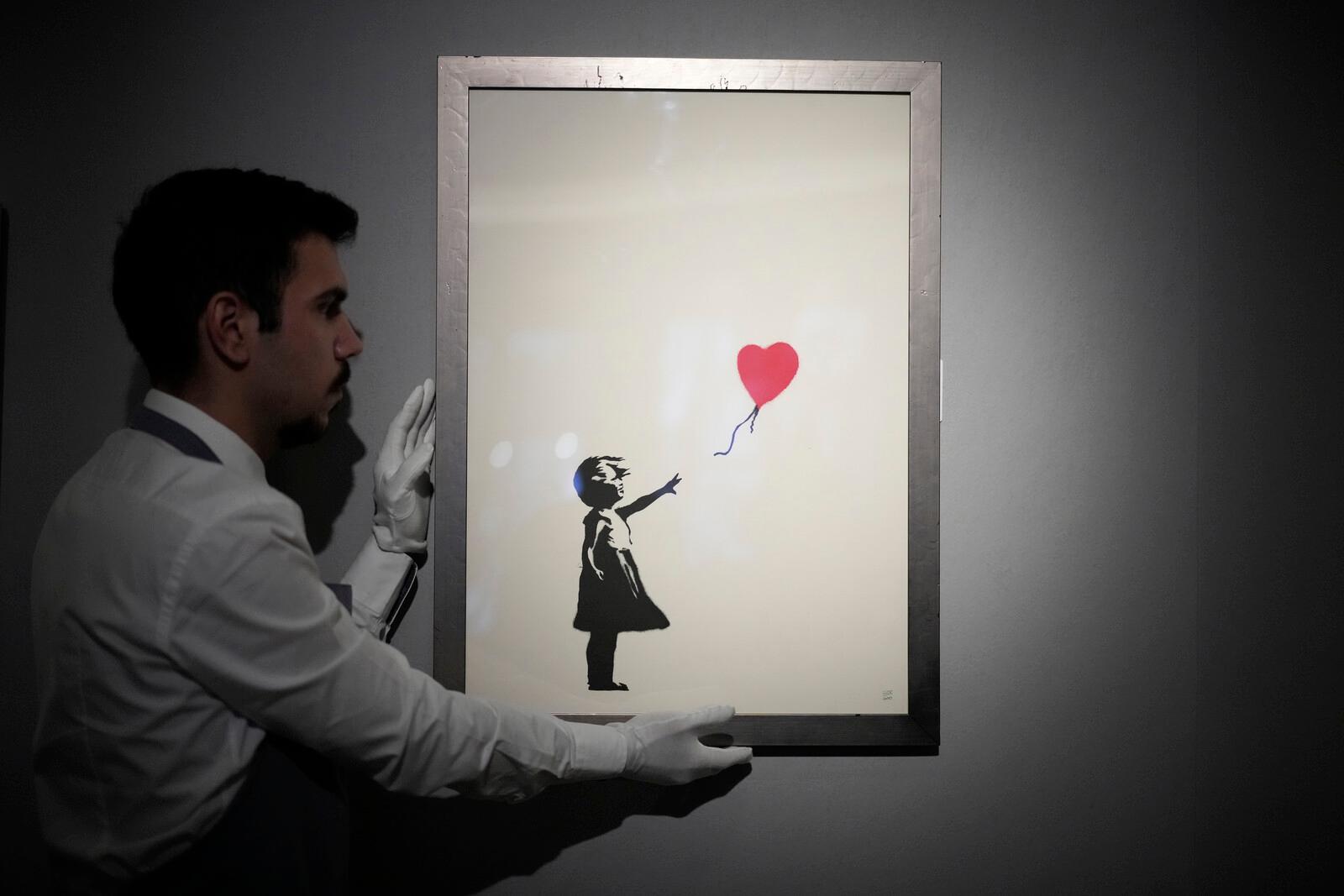 Two charged for Banksy theft