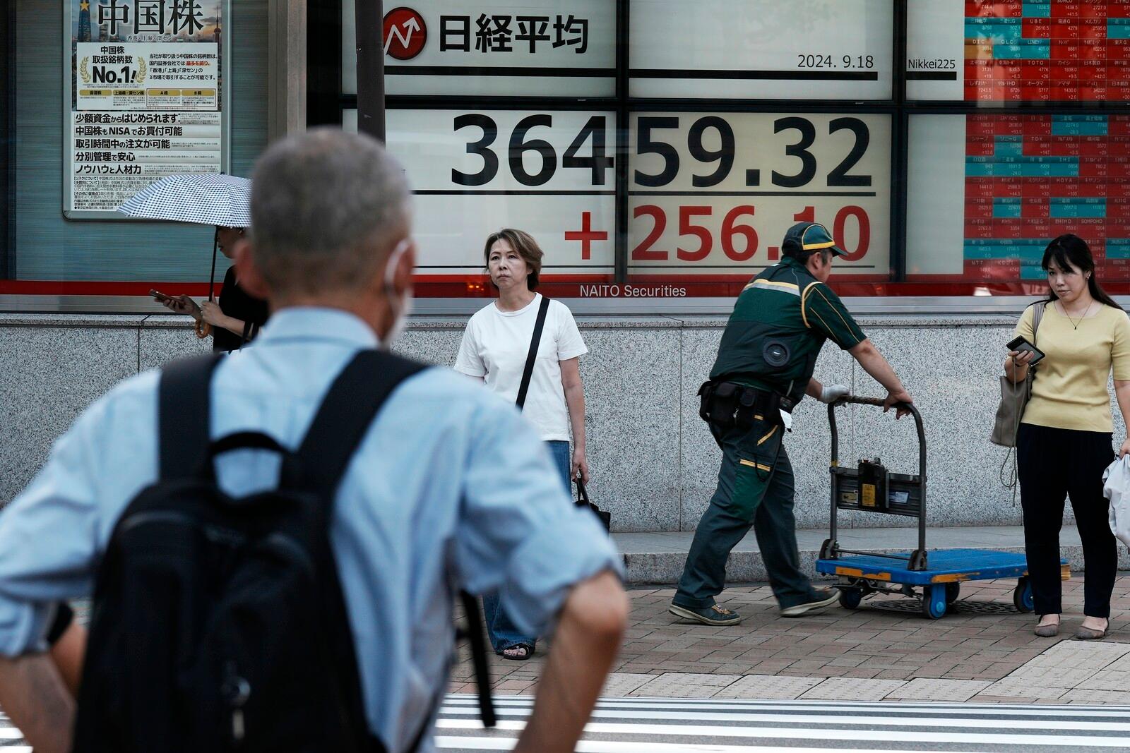 Japan's stock exchanges rise ahead of Fed's decision