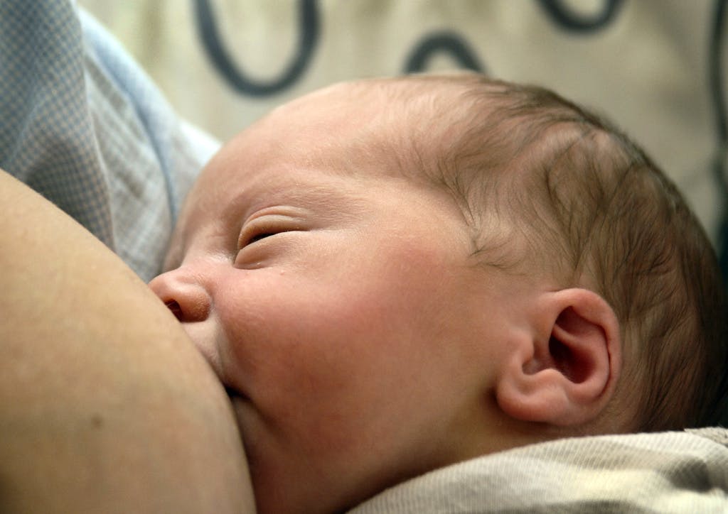 Why don't men breastfeed their children?