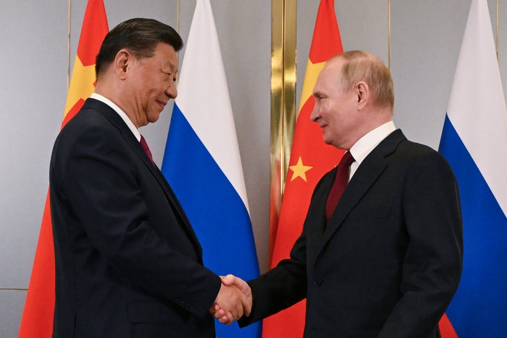 Putin and Xi in a Friendly Meeting