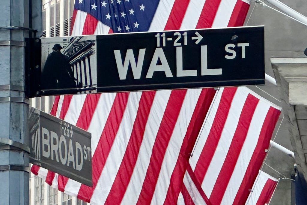 Up on shaky Wall Street