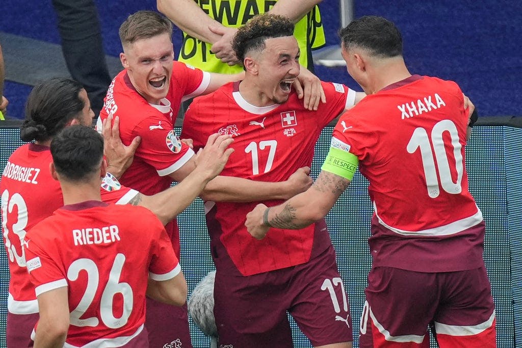 Switzerland advances – knocked out the reigning champion