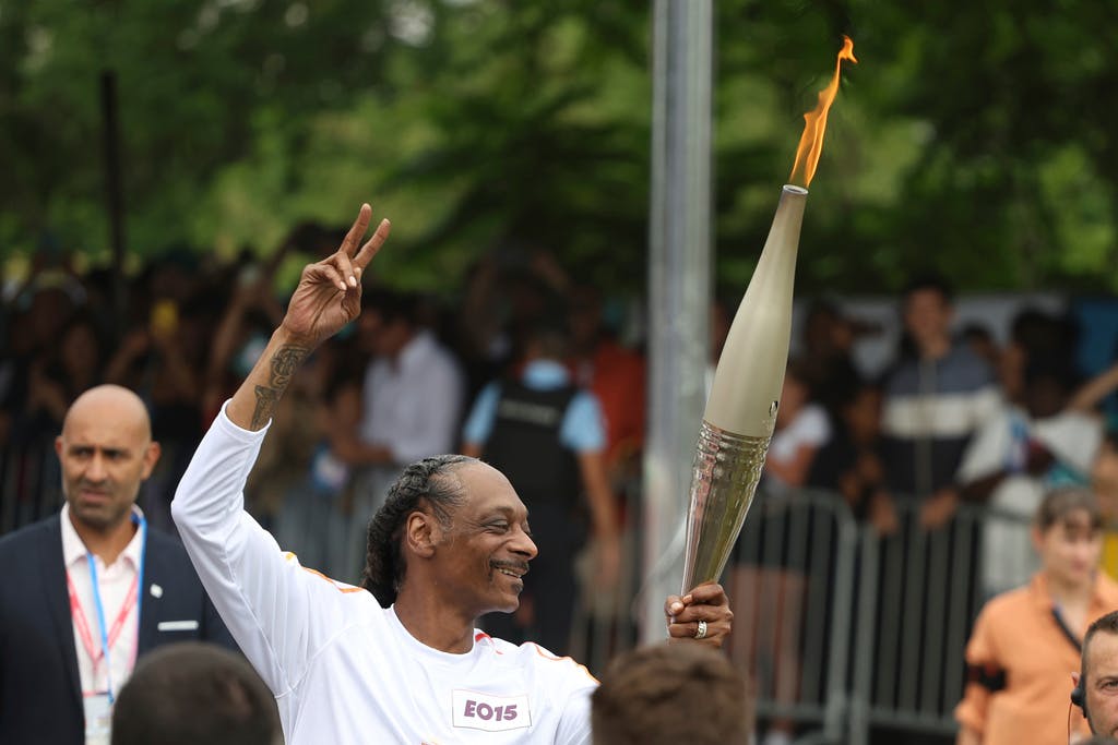 Snoop Dogg carries the Olympic torch